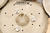 Each cymbal is perforated with holes that range from 5mm (10